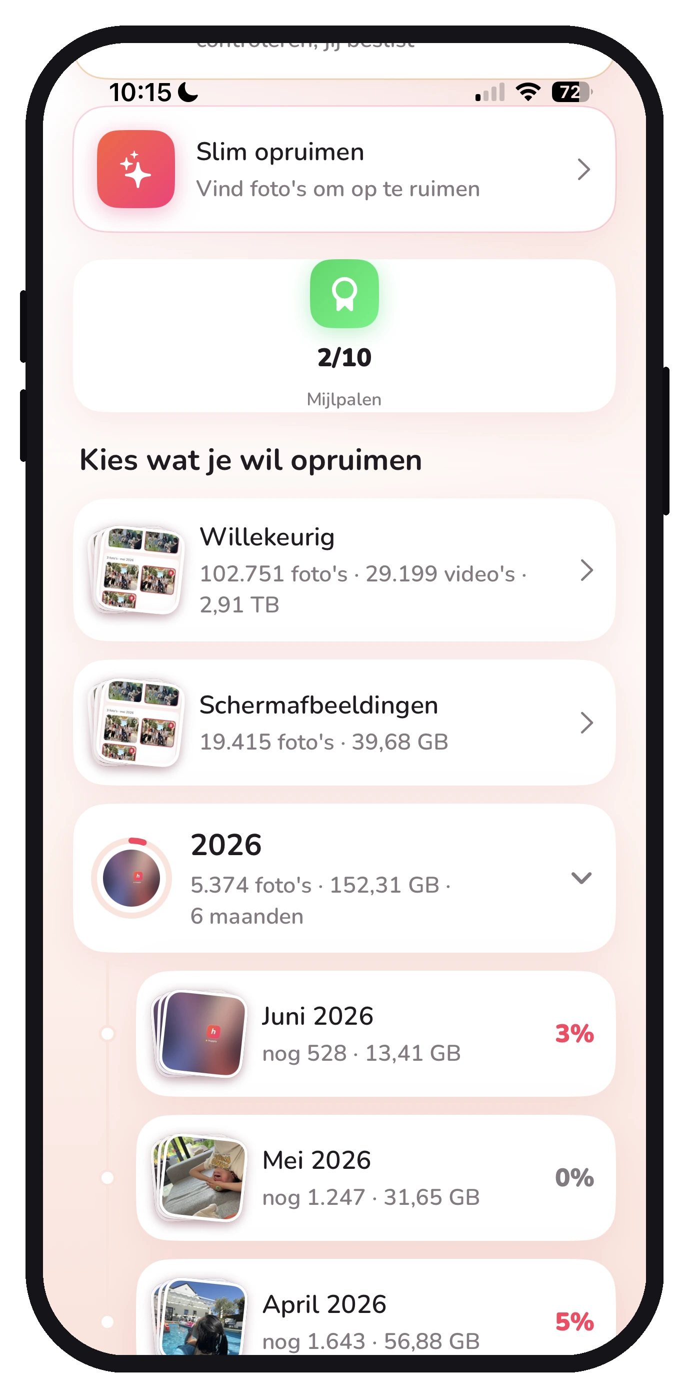 Het overzicht van Huppla met je foto’s per maand en hoeveel procent al is opgeruimd