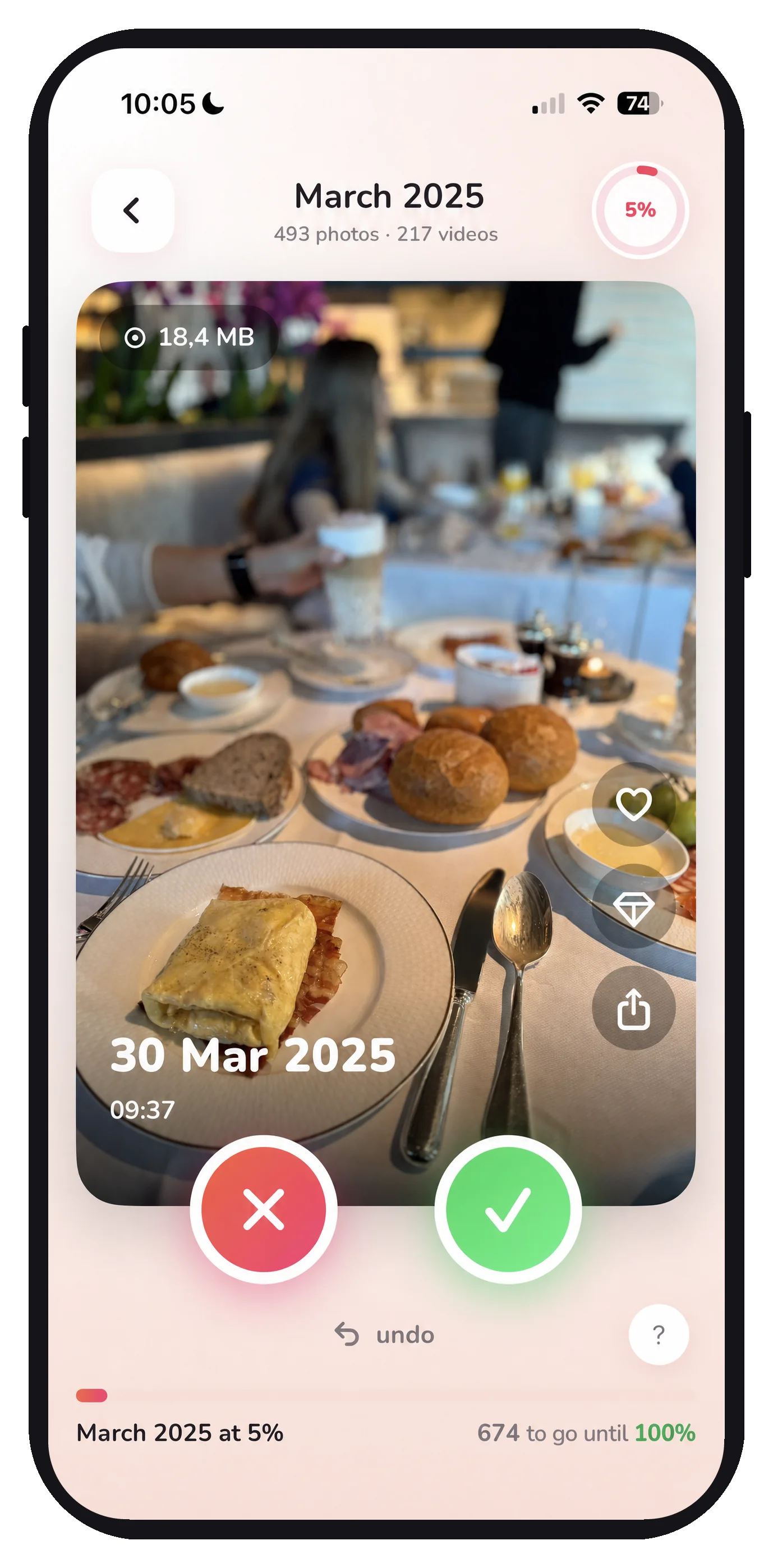 The Huppla swipe screen with a photo and this month’s progress