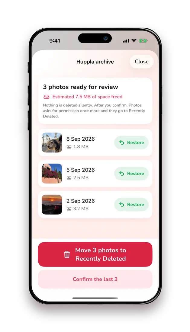 Huppla archive screen with photos, Restore buttons and a red confirm button